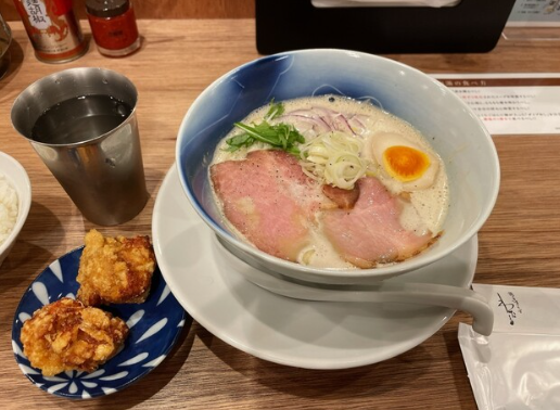 Kitchen and service staff at Ramen restaurant in Osaka